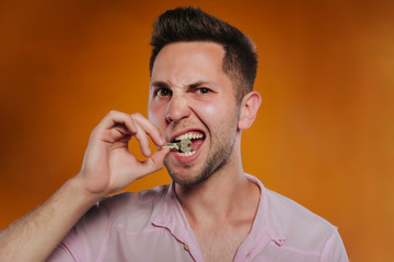Content Young Man Holding Key to New house