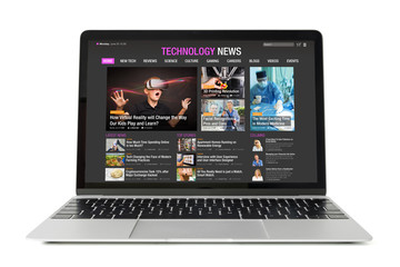 Sample technology news website on laptop. All contents are made up.
