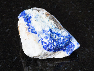 rough Lazurite (Lapis Lazuli) gemstone on black