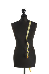 Tailor's mannequin with measuring tape on white background