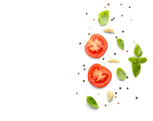 Fresh green basil with tomatoes and spices on white background