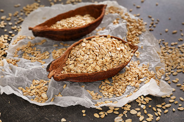 Cocoa pods with oatmeal on table
