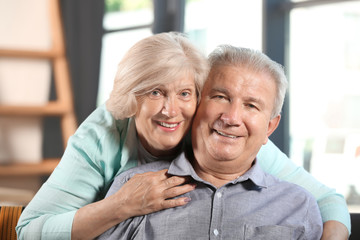 Happy senior couple at home