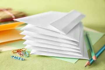 Mail envelopes on color background, closeup