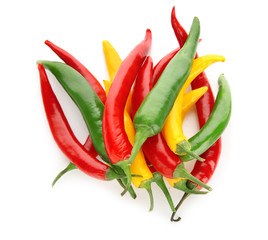 Different chili peppers on white background