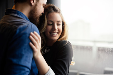 Happy couple hugging and sharing emotions