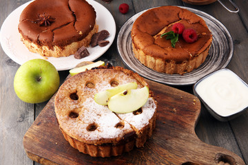 Obraz na płótnie Canvas Homemade cheesecake, apple pie and chocolate cheesecakedessert - healthy organic summer dessert pie