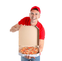 Young man holding box with tasty pizza on white background. Food delivery service