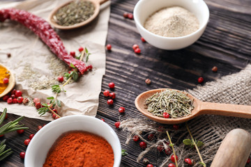 Various spices on wooden table