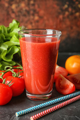 Glass of fresh tasty smoothie and ingredients on table