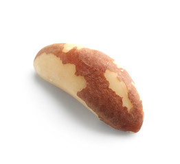 Tasty Brazil nut on white background