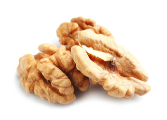 Tasty walnuts on white background