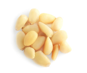 Tasty pine nuts on white background
