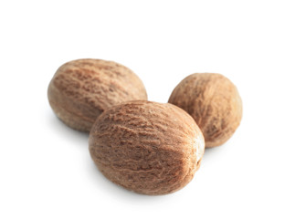 Nutmegs on white background