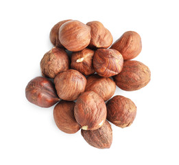 Tasty hazelnuts on white background