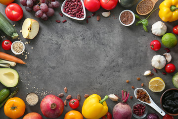 Composition with various healthy products on grey background