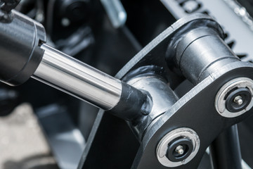 pipes and the hydraulic system of the tractor or excavator.Focus on the left side of the frame on...