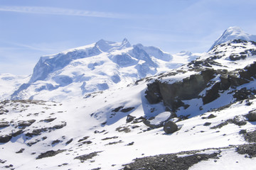 snow-capped mountain peaks, rocks and glaciers in the Swiss Alps; Monte Rosa massif (Zermatt)