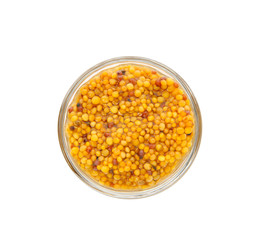 Fototapeta na wymiar Bowl with mustard sauce on white background, top view