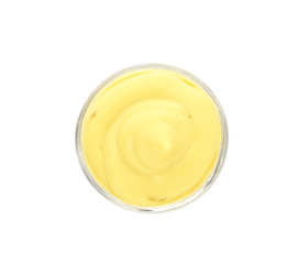 Bowl with tasty sauce on white background, top view