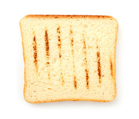 Tasty toasted bread on white background, top view