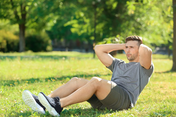 Sporty man training in park
