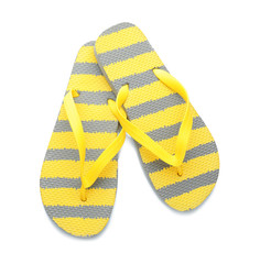 Female beach flip-flops on white background