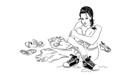 girl sits and smiles in a pile of clotches, a lot of things around, a day of washing, a choice of clothes