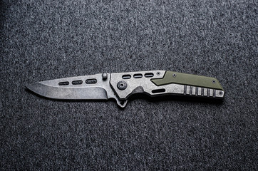 knife military on a dark background