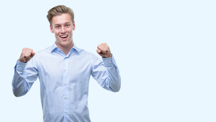 Young handsome blond man screaming proud and celebrating victory and success very excited, cheering emotion