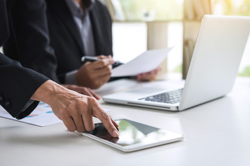 Startup business people group meeting, Young creative coworkers team working and discussing new plan project in office, entrepreneurs, brainstorming, Teamwork, analyze plans, professional investor