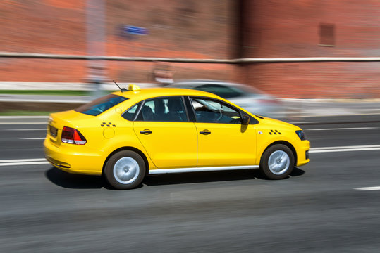 yellow taxi cab speeding © VladFotoMag