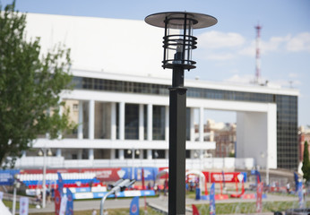 Lantern street lighting on a blurry background football fanzone