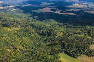 Landscape with beautiful green forest, meadows and fields in Czech republic, Europe