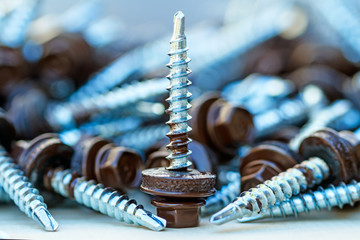 Screw with a drill for roofing