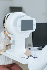 Ophthalmologist Checking Patient's Sight