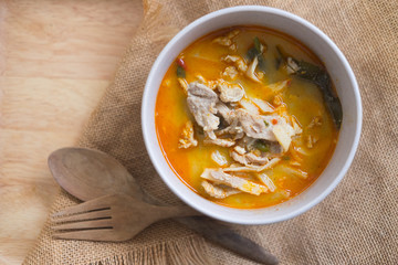Spicy boiled pork with bamboo shoot in coconut milk curry,