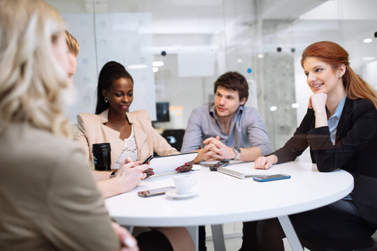 Business people board meeting in modern office