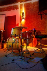 Fototapeta na wymiar Drums in pub. Picture of drums. Wal background.