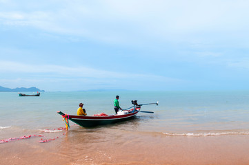 Peaceful beach of southern Thailand, Samui island far in background. Khanom, Nakhon Si Thammarat