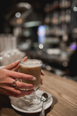 Cup of hot coffee in café