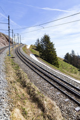 Fototapeta na wymiar Rigi bahn electric cable tram on Rigi kulm , Alpine mountain