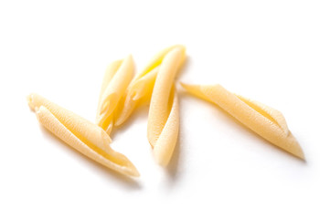 closeup of penne pasta on white background