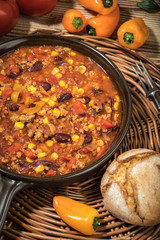 Chili con carne in a clay pan.