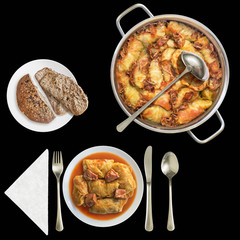 Traditional domestic gourmet Pickled Cabbage Rolls served with Integral Brown Bread Isolated on Black Background