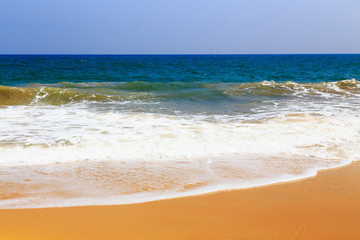 Soft wave of ocean on the sandy beach