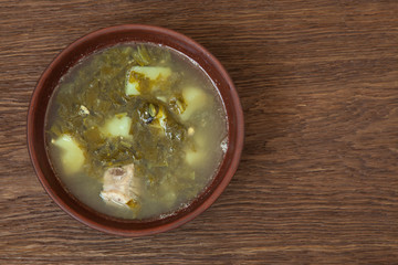 ukraine cuisine home broom sorrel on a wooden background top view