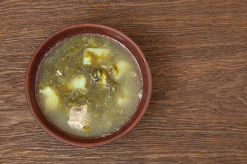 ukraine cuisine home broom sorrel on a wooden background top view