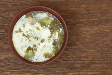 ukraine cuisine home broom sorrel on a wooden background top view