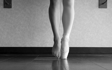 Black and white version of En pointe and the behind the scenes of a ballet dancer's hard work and training